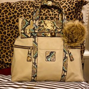 Snake 🐍 skin styled Henri bendel jetsetter